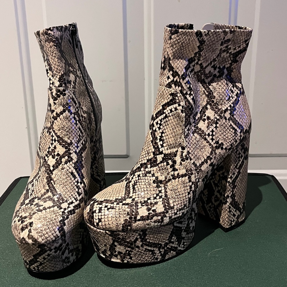 Snakeskin platform booties